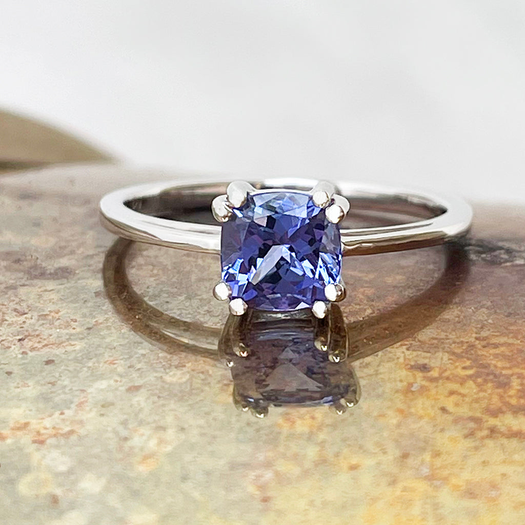 Gracefully Elevated Cushion Cut Four Claw White Gold Tanzanite
