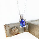 Gorgeous Oval Cut Tanzanite with Diamond Claw, Bale and Band Accent Pendant