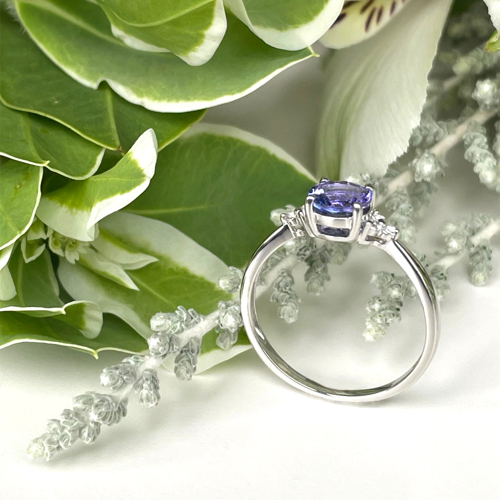 Silver Round Cut Tanzanite with Trilogy Diamond Highlight Ring