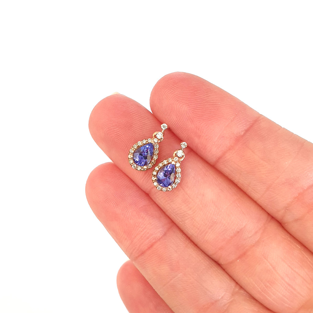 Scintillating Pear Cut Tanzanite and White Diamond Halo and Highlight Drop Earrings