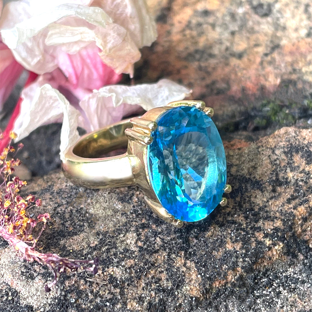 Solid Solitaire Deep Blue Topaz Oval Cut Double Claw Ring