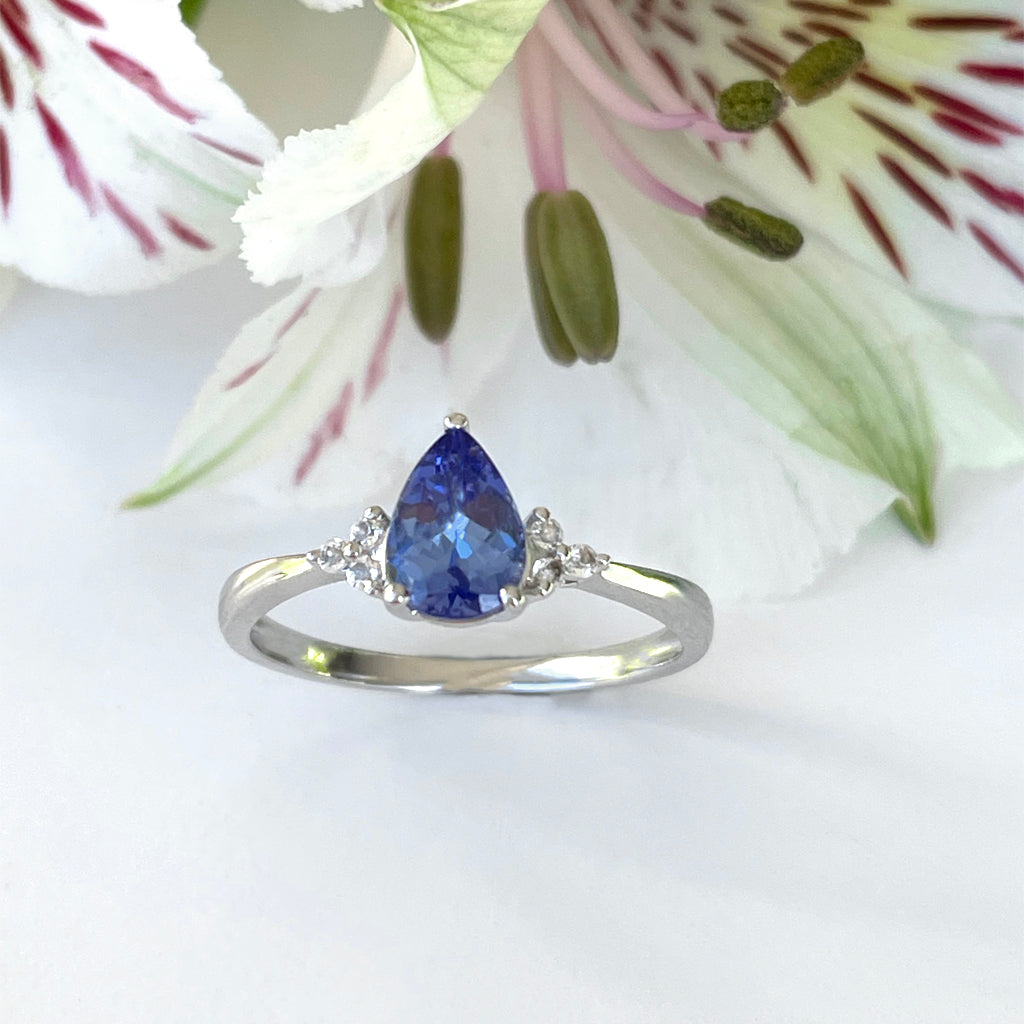 Silver Pear Cut Tanzanite with Trilogy Silver Topaz Highlight Ring