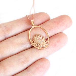 Oval Cut Out Protea Pendant with Diamonds in Rose Gold