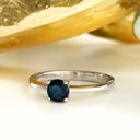 Solitaire blue sapphire white gold ring