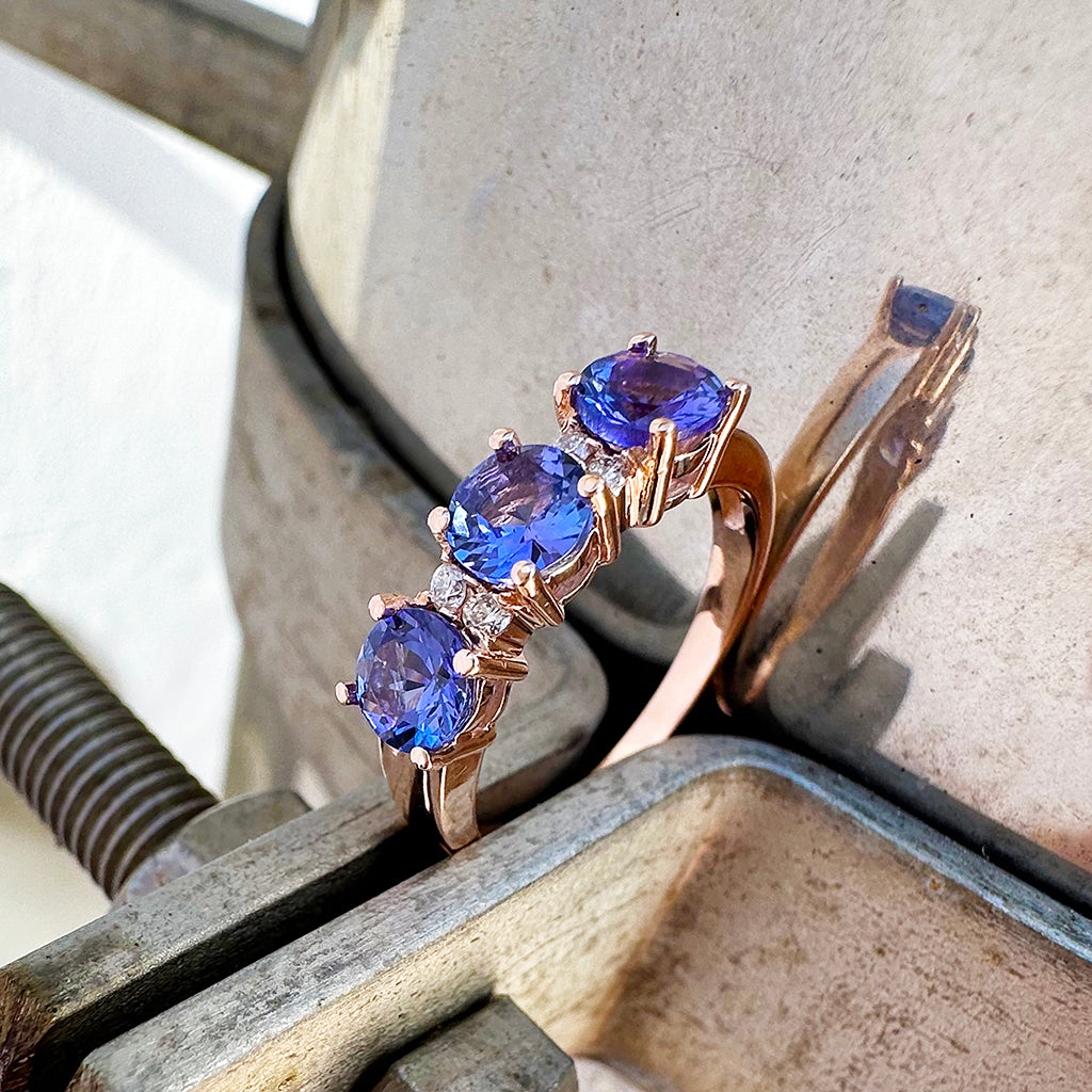 Trilogy Tanzanite Ring with Double Diamond Highlights in Rose Gold