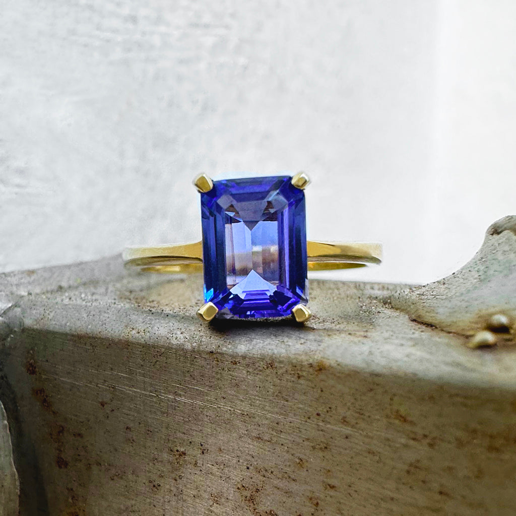 Elegant Solitaire Single Claw Emerald Cut Tanzanite Yellow Gold Ring