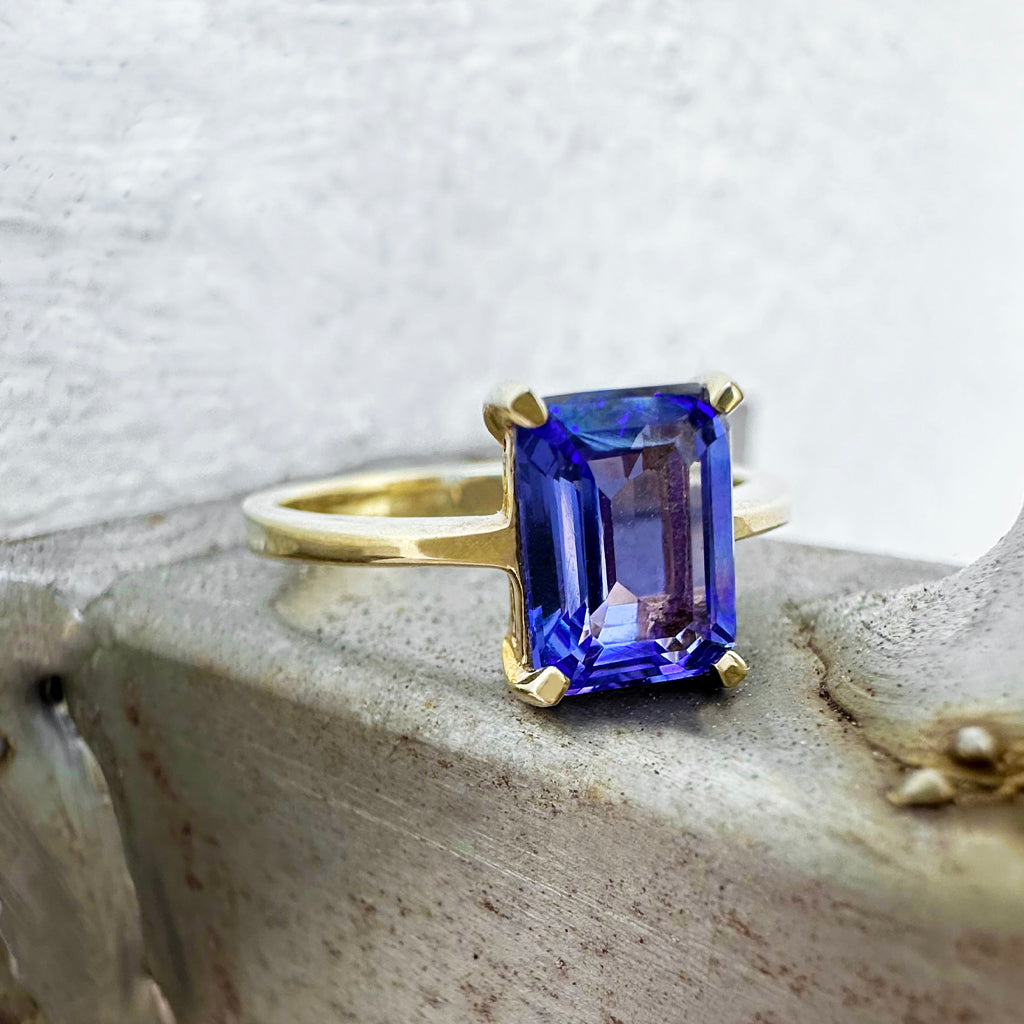 Elegant Solitaire Single Claw Emerald Cut Tanzanite Yellow Gold Ring