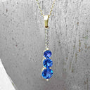 Tanzanite and Six Diamond Drop Yellow Gold Pendant