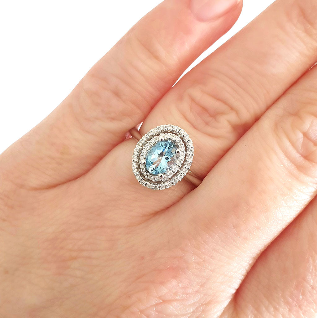 Double Halo Oval Cut Aquamarine and Diamond Ring