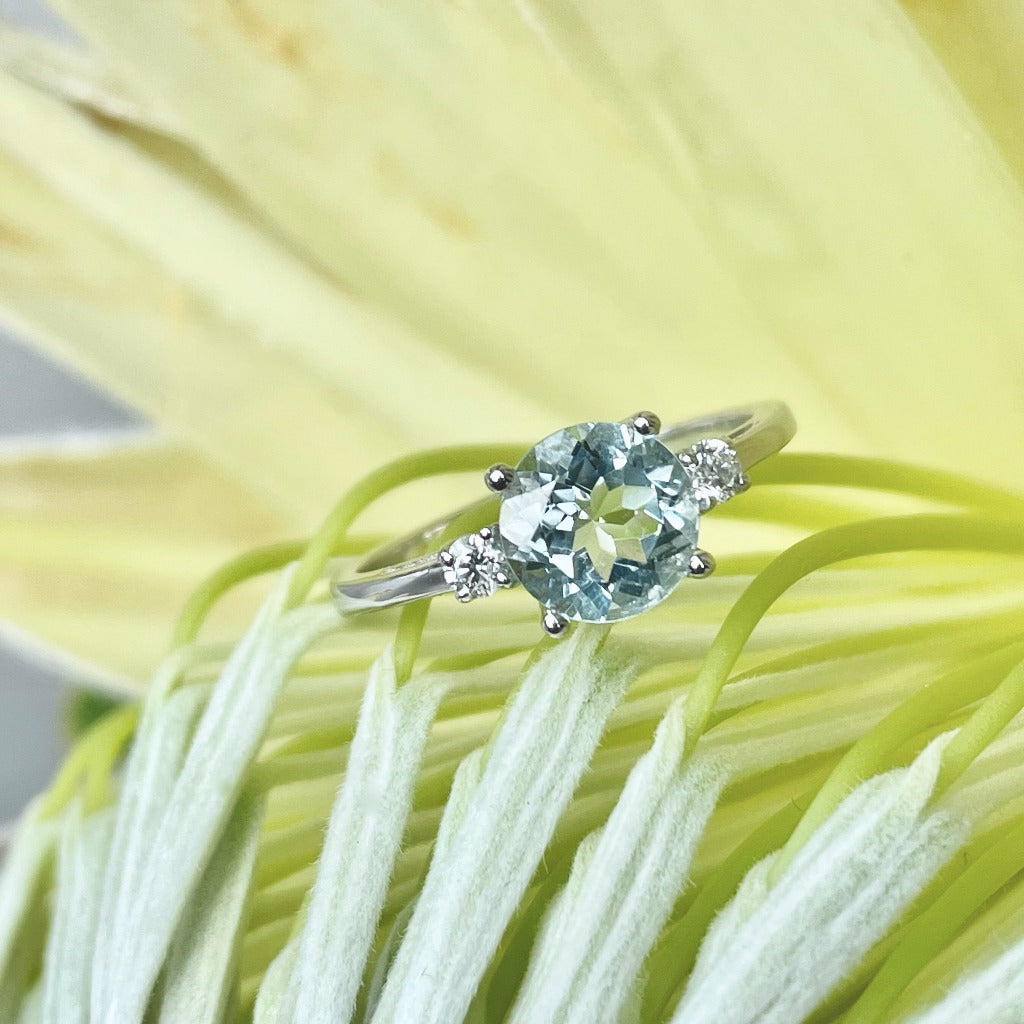 Elegant Round Cut Aquamarine and Diamond Accent White Gold Ring