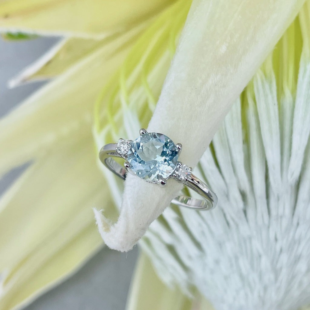 Elegant Round Cut Aquamarine and Diamond Accent White Gold Ring