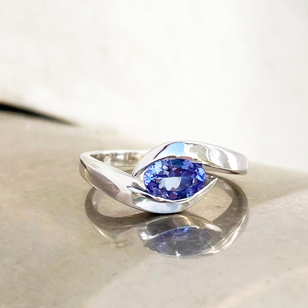 Gently Embraced Oval Tanzanite White Gold Ring