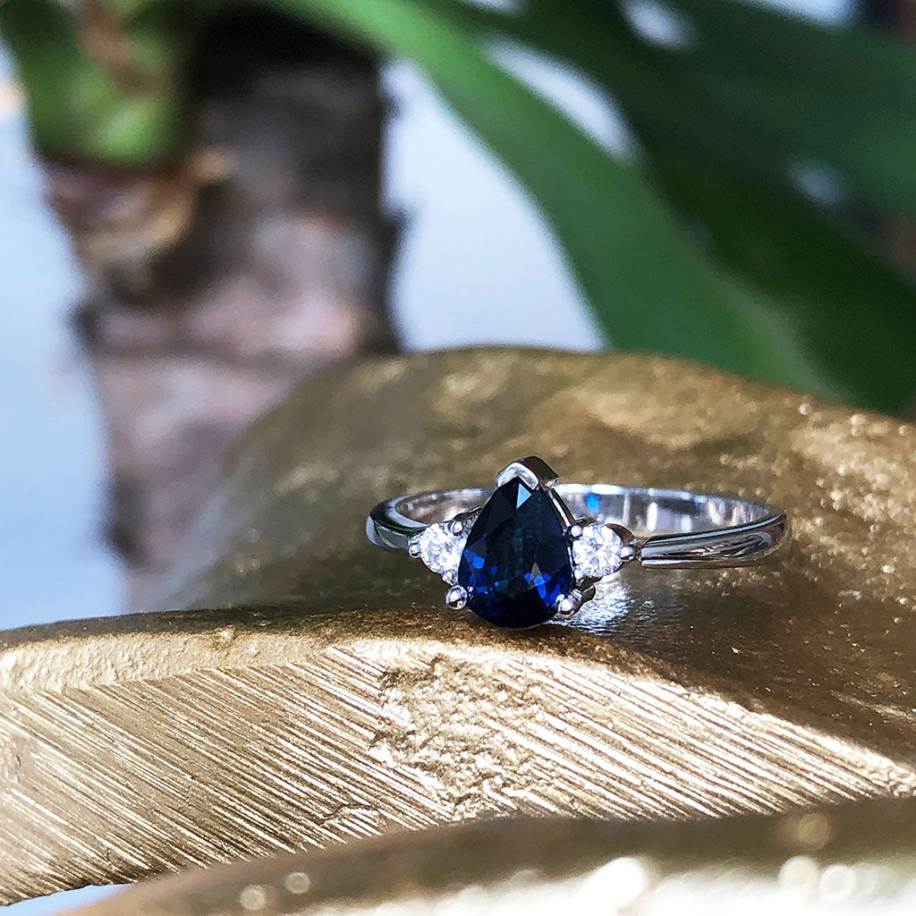 Handcrafted Pear Cut Blue Sapphire with Shoulder Diamond Accent