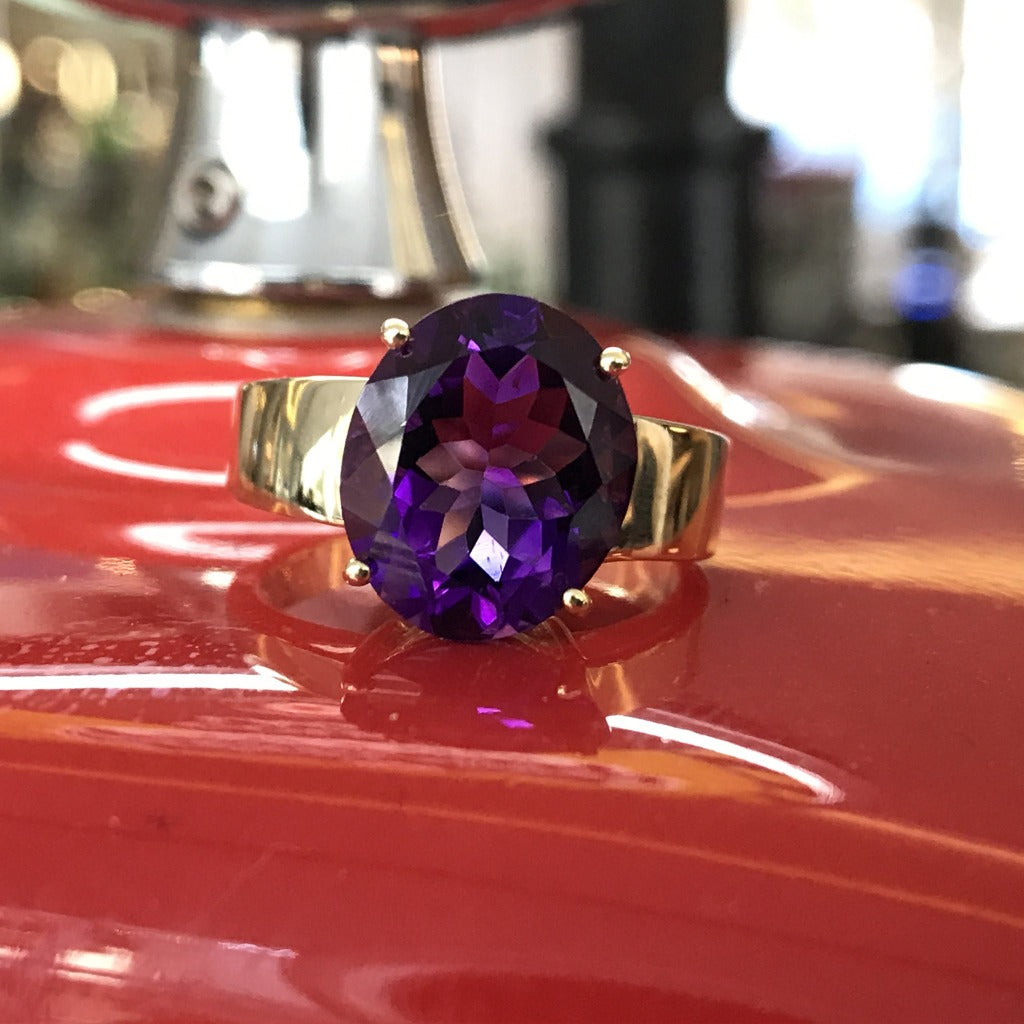 Oval Cut Amethyst and Yellow Gold Ring