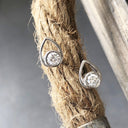 White Round Cut Diamonds in a White Gold Pear Shaped Stud