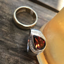 Pear Cut Garnet, Diamond and White Gold Ring