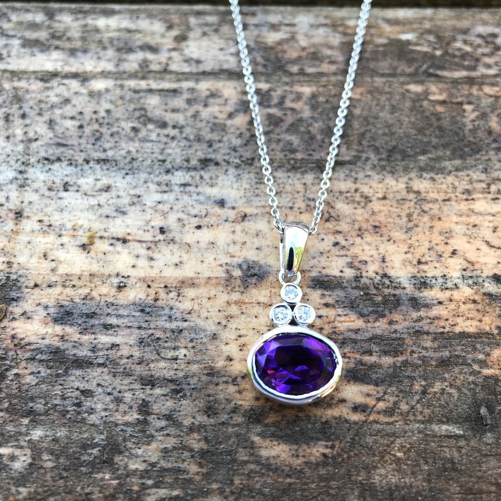 Oval Cut Amethyst with Trilogy Accent Pendant and Chain