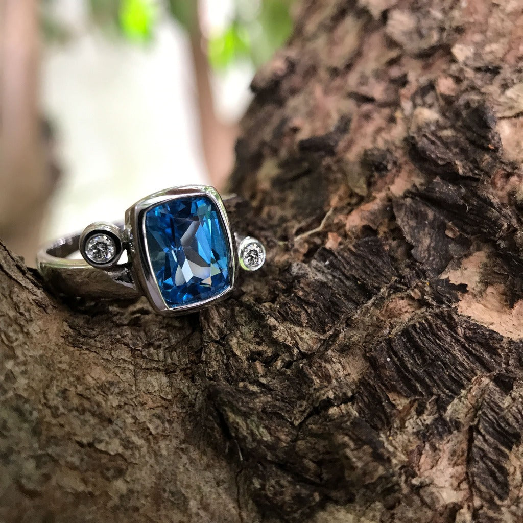 Cushion Cut Blue Topaz Ring with Diamond Accents – Afrogem Jewellers