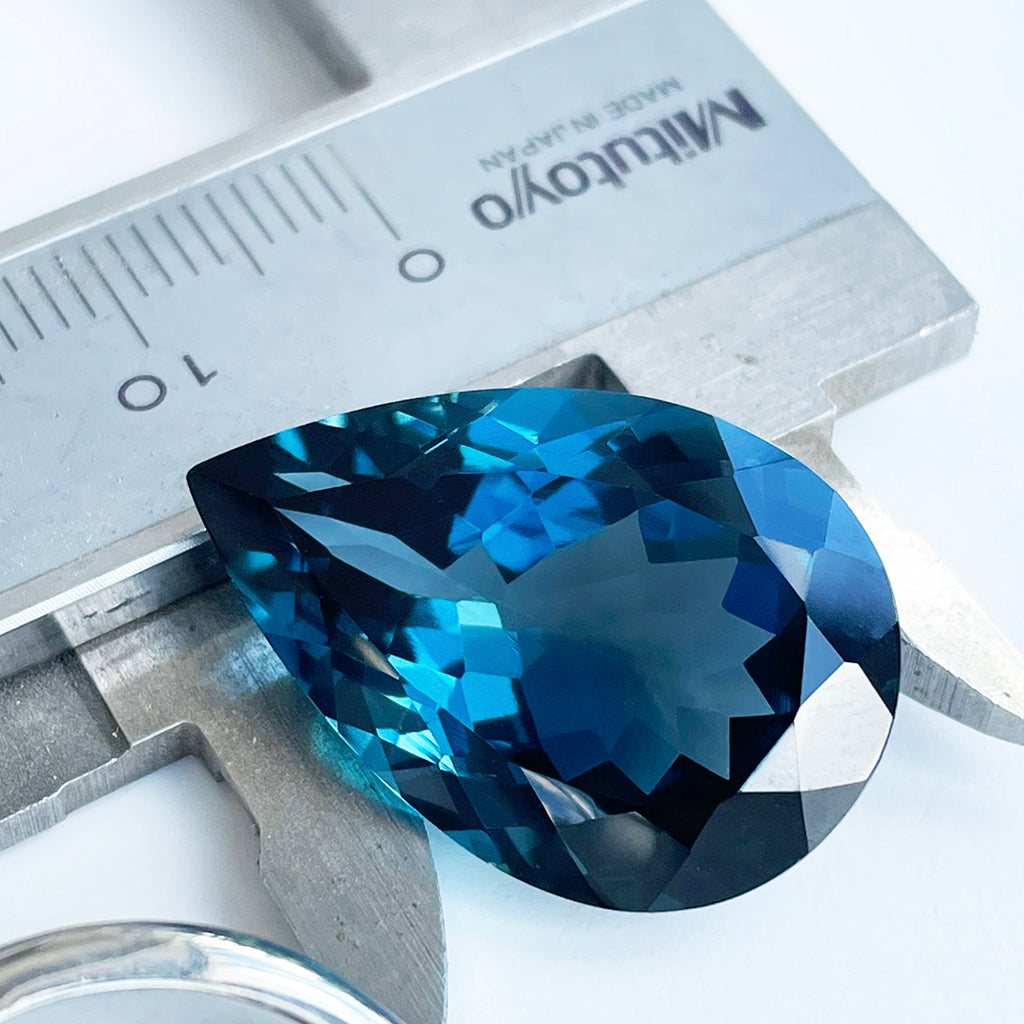 Topaz - London Blue Pear Cut - 26.35ct – Afrogem Jewellers