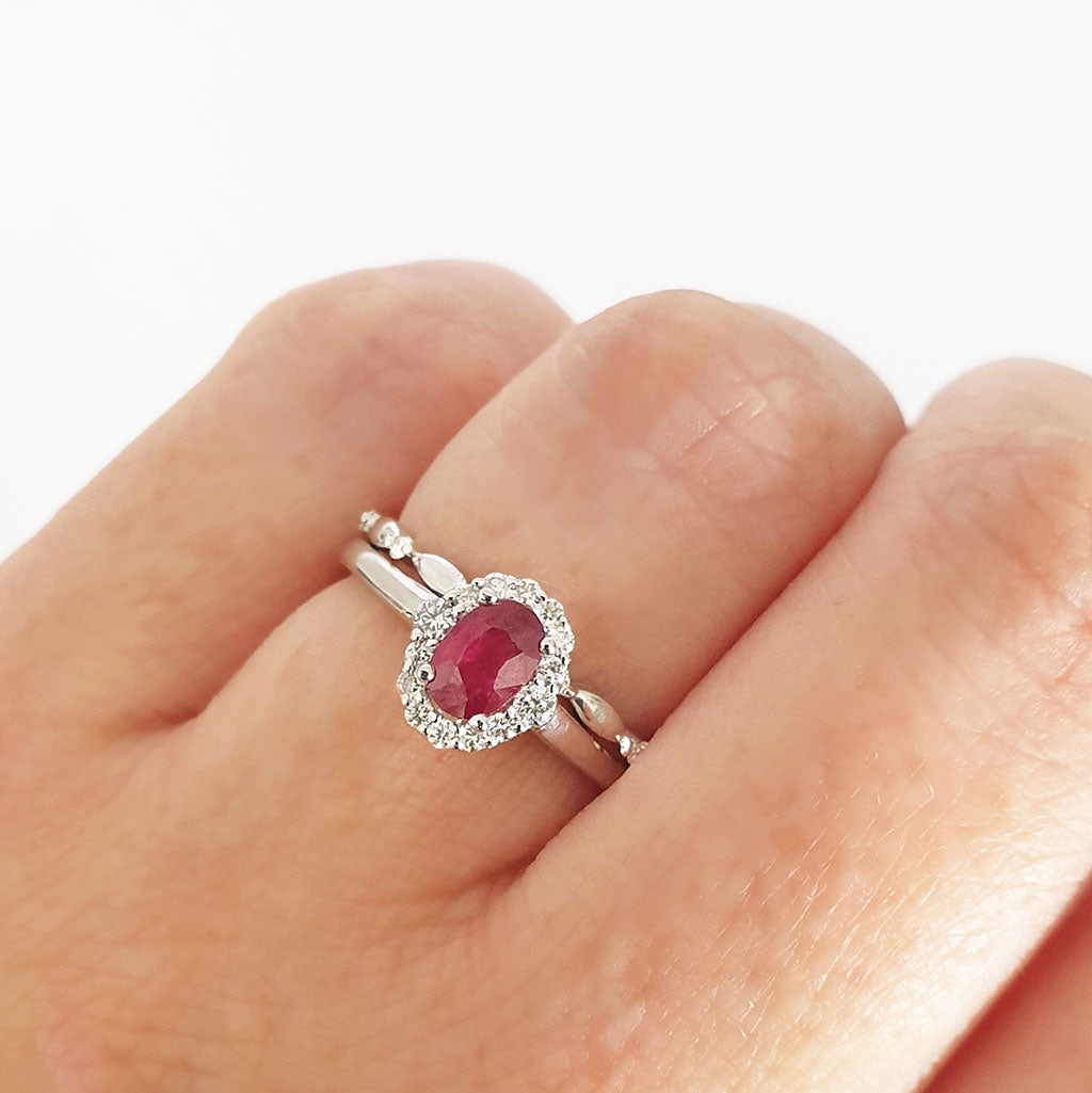 Oval Ruby and Diamond Halo Engagement Ring with Diamond Crimped Wedding Band Set