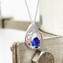 Side Filigree Pear Cut Tanzanite White Gold Pendant