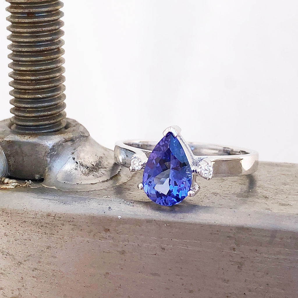 Wide White Gold Band, Pear Cut Tanzanite with Petite Diamond Accents Ring