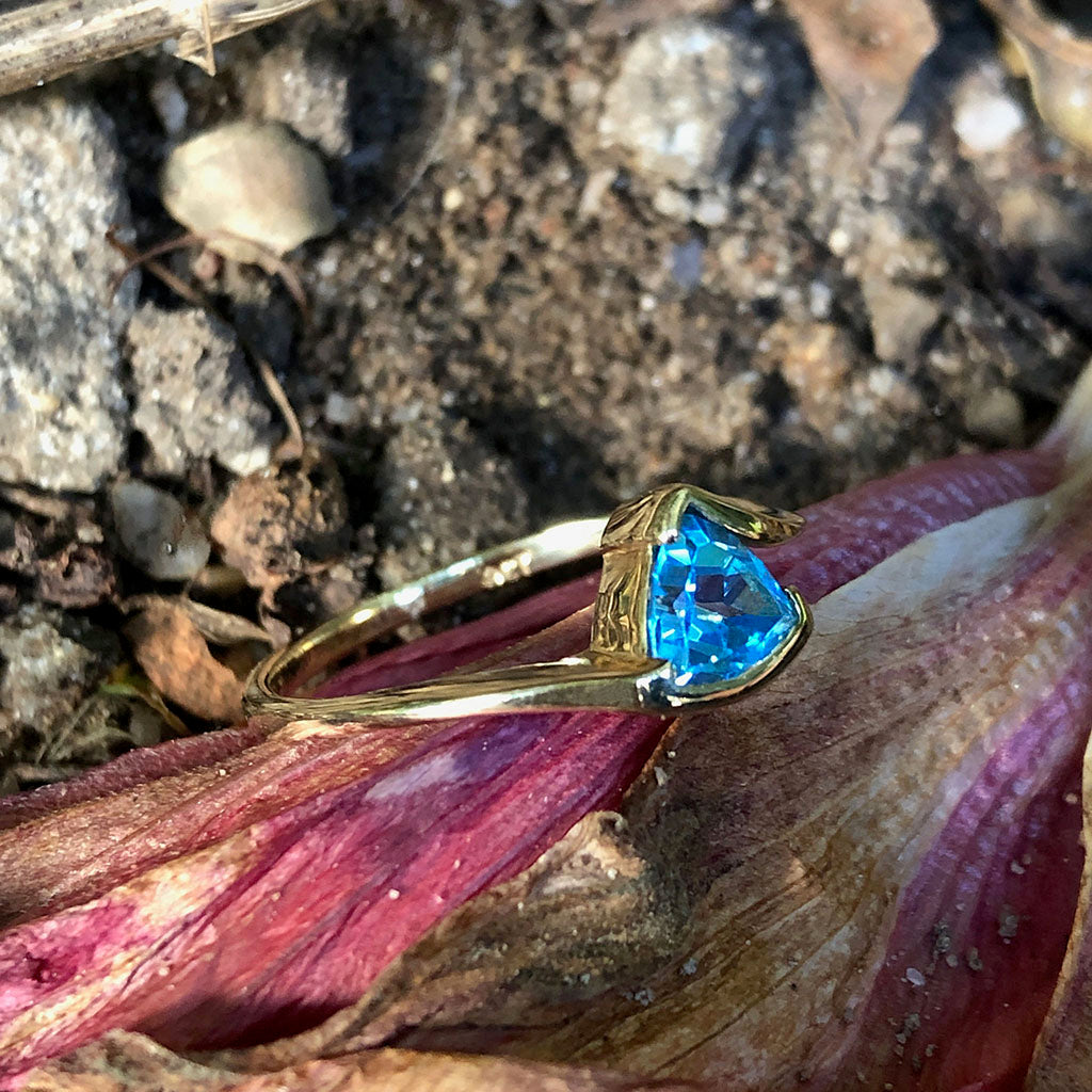 Trilliant Cut Blue Topaz and Yellow Gold Ring