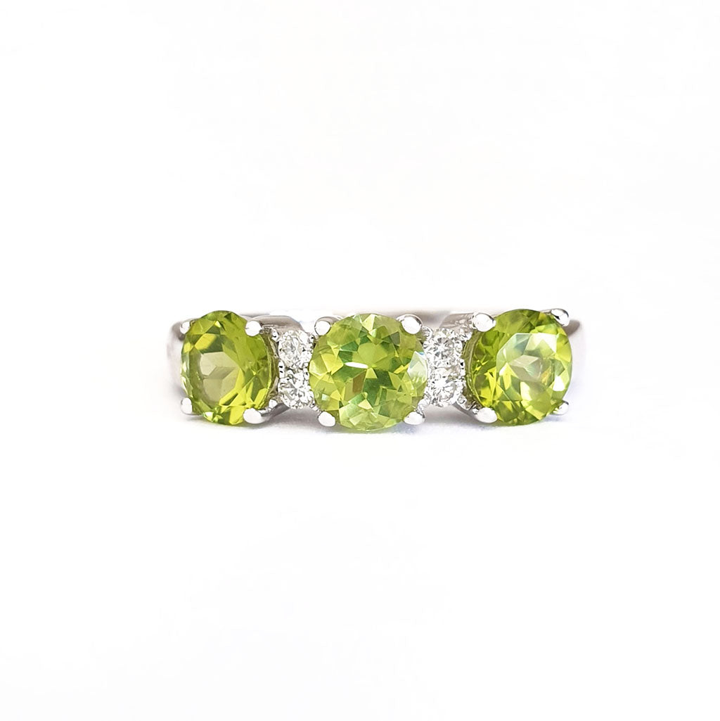 Trilogy Peridot Ring with Double Diamond Highlights