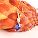 Alluring Pear Cut Tanzanite and Diamond Rose Gold Double Bale Pendant