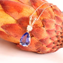 Alluring Pear Cut Tanzanite and Diamond Rose Gold Double Bale Pendant