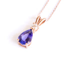 Alluring Pear Cut Tanzanite and Diamond Rose Gold Double Bale Pendant