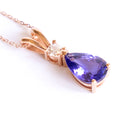 Alluring Pear Cut Tanzanite and Diamond Rose Gold Double Bale Pendant