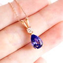 Alluring Pear Cut Tanzanite and Diamond Rose Gold Double Bale Pendant