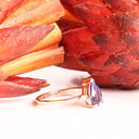 Alluring Pear Cut Tanzanite and Diamond Rose Gold Ring