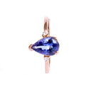 Alluring Pear Cut Tanzanite and Diamond Rose Gold Ring