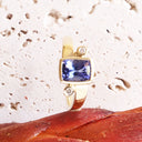 Bezel Set Cushion Cut Tanzanite Yellow Gold Ring with Diamond Accents