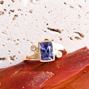 Bezel Set Cushion Cut Tanzanite Yellow Gold Ring with Diamond Accents