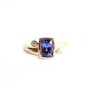 Bezel Set Cushion Cut Tanzanite Yellow Gold Ring with Diamond Accents