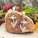 Bird of paradise white gold drop earrings