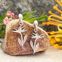 Bird of paradise white gold drop earrings
