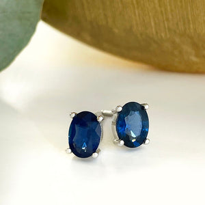 Oval blue sapphire gold stud earrings