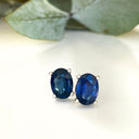 Oval blue sapphire gold stud earrings