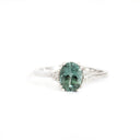 Breathtaking Oval Cut Sea Green Tourmaline With Trilogy Diamond Shoulder Highlight Ring