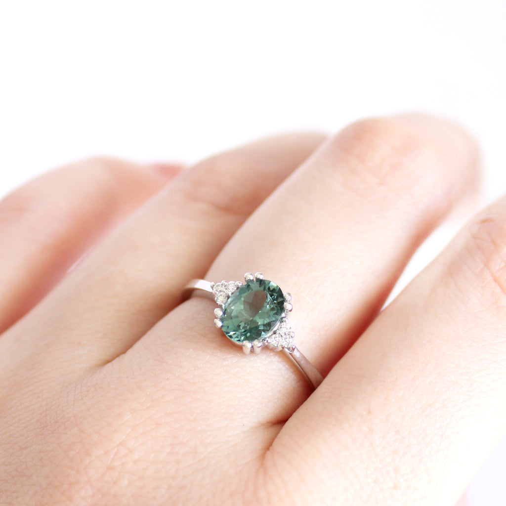 Breathtaking Oval Cut Sea Green Tourmaline With Trilogy Diamond