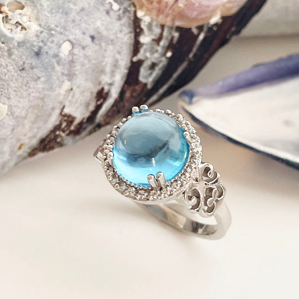 Blue Topaz Cabochon and diamond ring