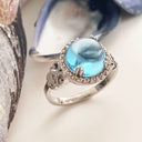 Blue Topaz Cabochon and diamond ring