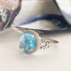 Blue Topaz Cabochon and diamond ring