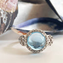 Blue Topaz Cabochon and diamond ring