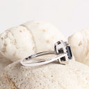Captivating Emerald Cut Black Diamond With White Diamond Halo White Gold Ring