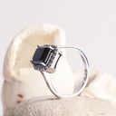 Captivating Emerald Cut Black Diamond With White Diamond Halo White Gold Ring